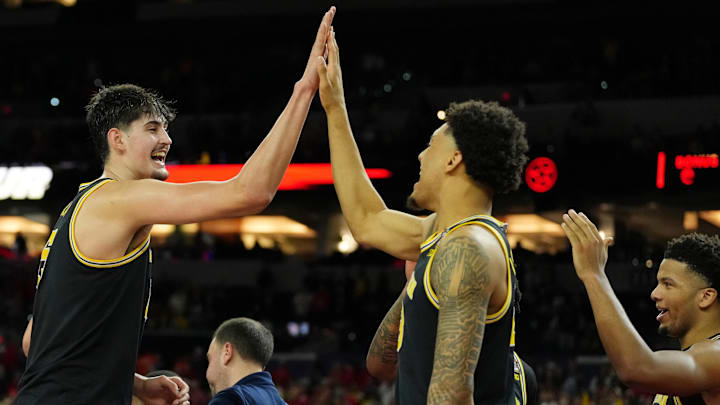 Apr 4, 2026; Indianapolis, IN, USA; Michigan Wolverines center Aday Mara (15) high fives forward Yaxel Lendeborg (23) during the second half in a semifinal of the Final Four of the men's 2026 NCAA Tournament at Lucas Oil Stadium. Apr 4, 2026; Indianapolis, IN, USA; Michigan Wolverines center Aday Mara (15) high fives forward Yaxel Lendeborg (23) during the second half in a semifinal of the Final Four of the men's 2026 NCAA Tournament at Lucas Oil Stadium.