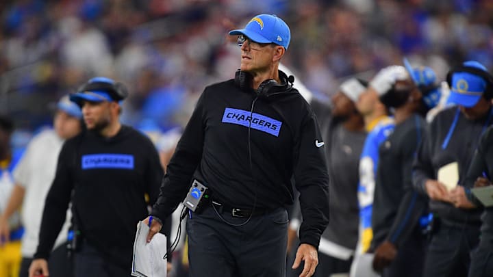 Dec 19, 2024; Inglewood, California, USA; Los Angeles Chargers head coach Jim Harbaugh watches game action against the Denver Broncos during the first half at SoFi Stadium. Mandatory Credit: Gary A. Vasquez-Imagn Images
