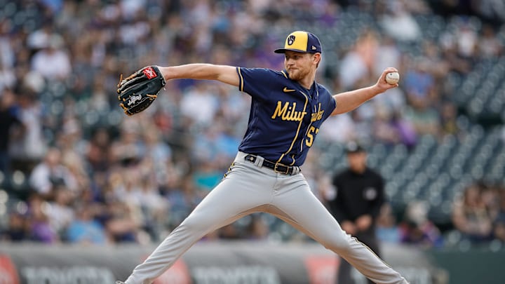 Milwaukee Brewers starting pitcher Eric Lauer (52) pitches in the first inning against the Colorado Rockies at Coors Field in 2023.