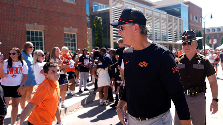 Oklahoma State Interim Head Coach/Offensive Coordinator walks in the Spirit Walk before the college football game between the Oklahoma State Cowboys and the Baylor Bears at Boone Pickens Stadium in Stillwater, Okla., Saturday, Sept. 27, 2025.