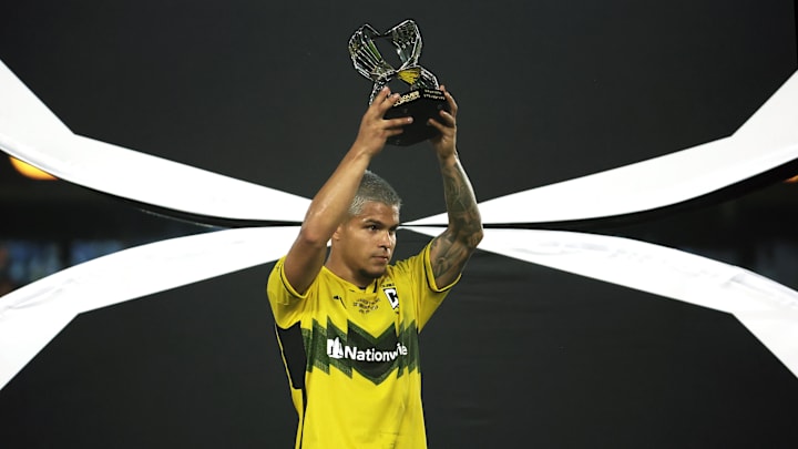 Aug 25, 2024; Columbus, Ohio, USA; Columbus Crew forward Cucho Hernandez (9) holds up the best player trophy after their win against LAFC in the Leagues Cup Final at Lower.com Field. Mandatory Credit: Trevor Ruszkowski-USA TODAY Sports