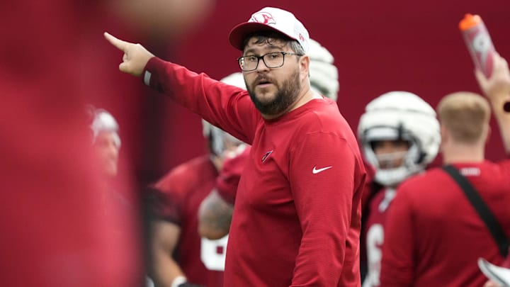 Arizona Cardinals assistant defensive line coach William Peagler talks to his team during training camp at State Farm Stadium in Glendale on July 25, 2024.