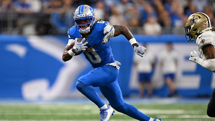 Detroit Lions running back Jahmyr Gibbs (0) carries the ball against the New Orleans Saints during the fourth quarter at Ford Field. Detroit Lions running back Jahmyr Gibbs (0) carries the ball against the New Orleans Saints during the fourth quarter at Ford Field.