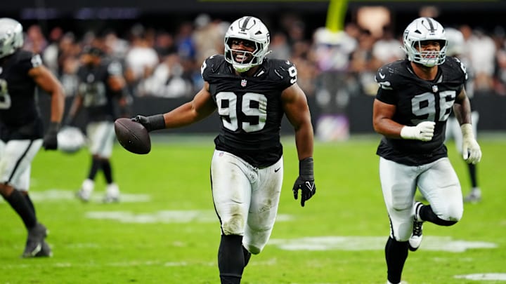 Las Vegas Raiders defensive tackle Thomas Booker (99) reacts after a play during the second half against the Tennessee Titans at Allegiant Stadium. Las Vegas Raiders defensive tackle Thomas Booker (99) reacts after a play during the second half against the Tennessee Titans at Allegiant Stadium.