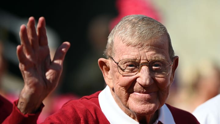 Oct 7, 2023; Raleigh, North Carolina, USA; Former North Carolina State Wolfpack head coach Lou Holtz is honored along with his 1973 football team during the first half at Carter-Finley Stadium. Mandatory Credit: Rob Kinnan-Imagn Images