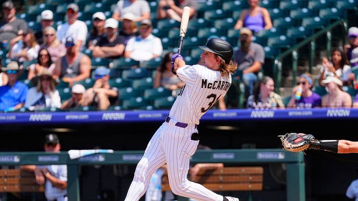 Jul 2, 2026; Denver, Colorado, USA; Colorado Rockies right fielder Jake McCarthy (31) hits a two run home run in the fourth inning against the Miami Marlins at Coors Field. Mandatory Credit: Ron Chenoy-Imagn Images Jul 2, 2026; Denver, Colorado, USA; Colorado Rockies right fielder Jake McCarthy (31) hits a two run home run in the fourth inning against the Miami Marlins at Coors Field. Mandatory Credit: Ron Chenoy-Imagn Images