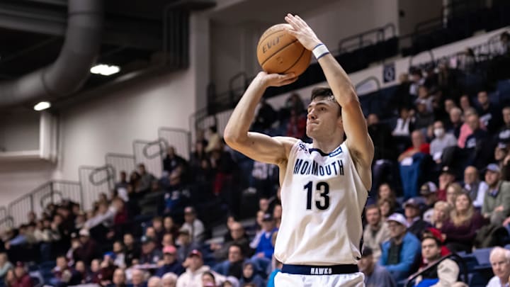 Jan 19, 2023; West Long Branch, New Jersey, USA; Monmouth Hawks guard Jack Collins (13) shoots a 3-pointer. 