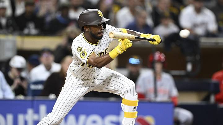 Jun 8, 2026; San Diego, California, USA; San Diego Padres left fielder Samad Taylor (0) hits an RBI bunt single during the seventh inning against the Cincinnati Reds at Petco Park. Mandatory Credit: Denis Poroy-Imagn Images Jun 8, 2026; San Diego, California, USA; San Diego Padres left fielder Samad Taylor (0) hits an RBI bunt single during the seventh inning against the Cincinnati Reds at Petco Park. Mandatory Credit: Denis Poroy-Imagn Images