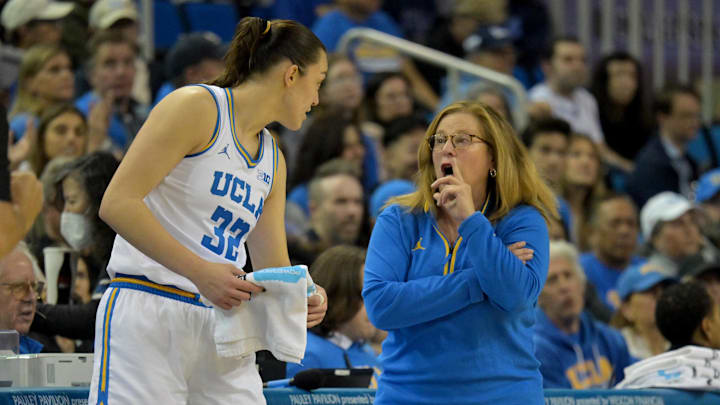 Dec 7, 2025; Los Angeles, California, USA;  UCLA Bruins forward Angela Dugalic (32) talks with head coach Cori Close during the first half against the Oregon Ducks at Pauley Pavilion presented by Wescom Financial. Mandatory Credit: Jayne Kamin-Oncea-Imagn Images