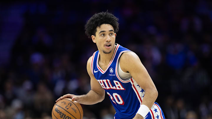 Dec 4, 2024; Philadelphia, Pennsylvania, USA; Philadelphia 76ers guard Jared McCain (20) controls the ball against the Orlando Magic during the fourth quarter at Wells Fargo Center. Mandatory Credit: Bill Streicher-Imagn Images