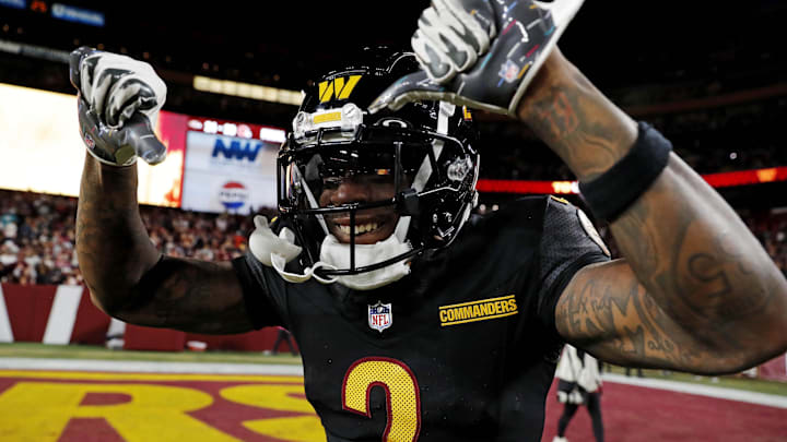 Oct 27, 2024; Landover, Maryland, USA; Washington Commanders wide receiver Dyami Brown (2) celebrates after the Washington Commanders beat the Chicago Bears on a Hail Mary pass with no time left at Commanders Field. Mandatory Credit: Peter Casey-Imagn Images