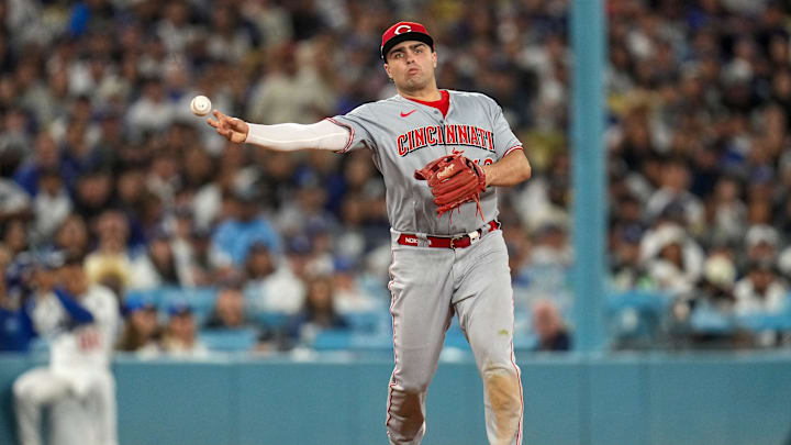 Cincinnati Reds third baseman Sal Stewart (43) plays a ground ball off the bat of Los Angeles Dodgers first baseman Enrique Hernandez (8) in the eighth inning of the MLB National League Wild Card Game 2 between the Los Angeles Dodgers and the Cincinnati Reds at Dodger Stadium in Los Angeles on Wednesday, Oct. 1, 2025. The Reds were eliminated from the postseason with an 8-4 loss to the reining World Series Champions La Dodgers.
