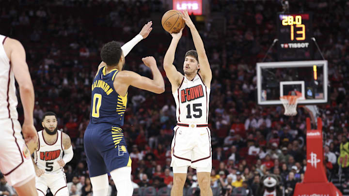 Nov 20, 2024; Houston, Texas, USA; Houston Rockets guard Reed Sheppard (15) shoots the ball as Indiana Pacers guard Tyrese Haliburton (0) defends during the first quarter at Toyota Center. Mandatory Credit: Troy Taormina-Imagn Images Nov 20, 2024; Houston, Texas, USA; Houston Rockets guard Reed Sheppard (15) shoots the ball as Indiana Pacers guard Tyrese Haliburton (0) defends during the first quarter at Toyota Center. Mandatory Credit: Troy Taormina-Imagn Images