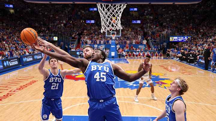 Fousseyni Traore hauls in a rebound against Kansas