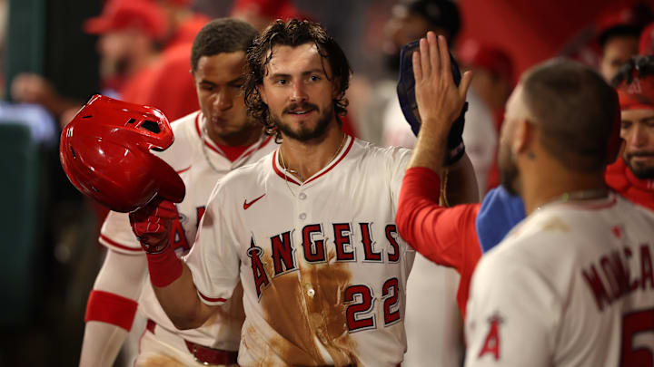 Aug 4, 2025; Anaheim, California, USA; Los Angeles Angels center fielder Bryce Teodosio (22) is greeted in the dugout after scoring a run during the sixth inning against the Tampa Bay Rays at Angel Stadium. Mandatory Credit: Kiyoshi Mio-Imagn Images Aug 4, 2025; Anaheim, California, USA; Los Angeles Angels center fielder Bryce Teodosio (22) is greeted in the dugout after scoring a run during the sixth inning against the Tampa Bay Rays at Angel Stadium. Mandatory Credit: Kiyoshi Mio-Imagn Images