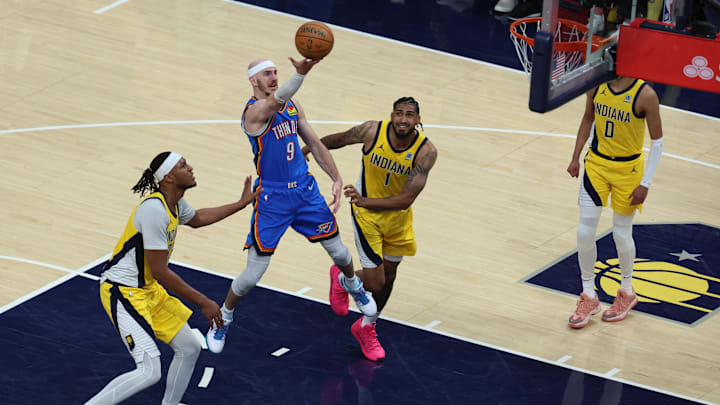 Jun 13, 2025; Indianapolis, Indiana, USA; Oklahoma City Thunder guard Alex Caruso (9) drives to the hoop past Indiana Pacers forward Obi Toppin (1) and center Myles Turner (33) during the third quarter of game four of the 2025 NBA Finals at Gainbridge Fieldhouse. Mandatory Credit: Trevor Ruszkowski-Imagn Images Jun 13, 2025; Indianapolis, Indiana, USA; Oklahoma City Thunder guard Alex Caruso (9) drives to the hoop past Indiana Pacers forward Obi Toppin (1) and center Myles Turner (33) during the third quarter of game four of the 2025 NBA Finals at Gainbridge Fieldhouse. Mandatory Credit: Trevor Ruszkowski-Imagn Images