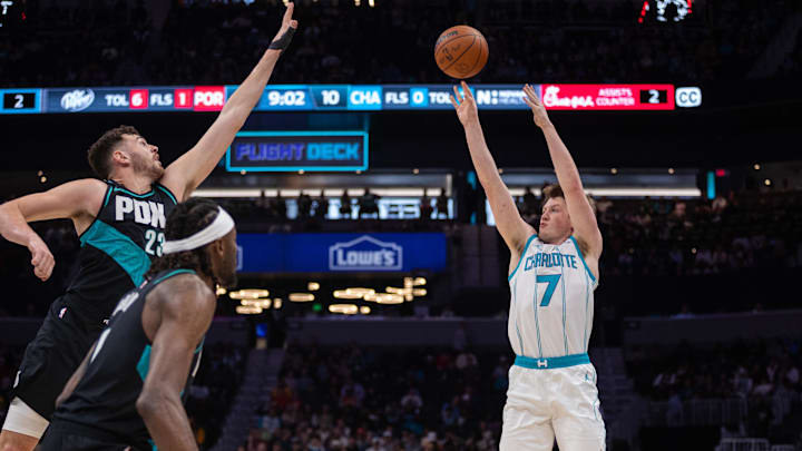 Feb 28, 2026; Charlotte, North Carolina, USA; Charlotte Hornets guard Kon Knueppel (7) shoots the ball against the Portland Trail Blazers during the first quarter at Spectrum Center. Mandatory Credit: Scott Kinser-Imagn Images