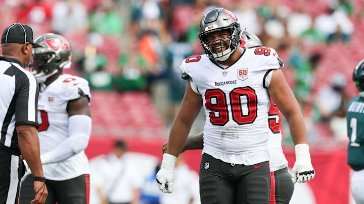 Sep 28, 2025; Tampa, Florida, USA; Tampa Bay Buccaneers defensive end Logan Hall (90) reacts after a play during the third quarter against the Philadelphia Eagles  at Raymond James Stadium. Mandatory Credit: Nathan Ray Seebeck-Imagn Images