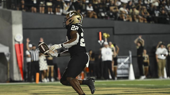 Aug 30, 2025; Nashville, Tennessee, USA; Vanderbilt Commodores running back Makhilyn Young (22) celebrates his touchdown against the Charleston Southern Buccaneers during the second half at FirstBank Stadium. Mandatory Credit: Steve Roberts-Imagn Images Aug 30, 2025; Nashville, Tennessee, USA; Vanderbilt Commodores running back Makhilyn Young (22) celebrates his touchdown against the Charleston Southern Buccaneers during the second half at FirstBank Stadium. Mandatory Credit: Steve Roberts-Imagn Images