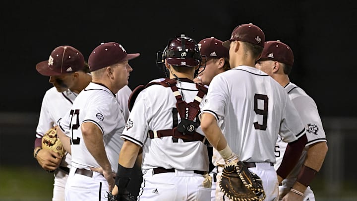 Jun 10, 2022; College Station, TX, USA; Texas A&M head coach Jim Schlossnagle walk out for a