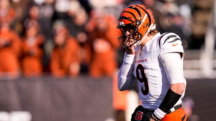 Cincinnati Bengals quarterback Joe Burrow (9) warms his hand between plays in the second quarter of the NFL Week 15 game between the Cincinnati Bengals and the Baltimore Ravens at Paycor Stadium in Cincinnati on Sunday, Dec. 14, 2025. Cincinnati Bengals quarterback Joe Burrow (9) warms his hand between plays in the second quarter of the NFL Week 15 game between the Cincinnati Bengals and the Baltimore Ravens at Paycor Stadium in Cincinnati on Sunday, Dec. 14, 2025.