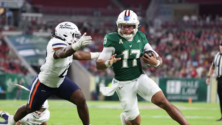 USF quarterback Byrum Brown runs the ball for a touchdown against the UTSA Roadrunners. USF quarterback Byrum Brown runs the ball for a touchdown against the UTSA Roadrunners.