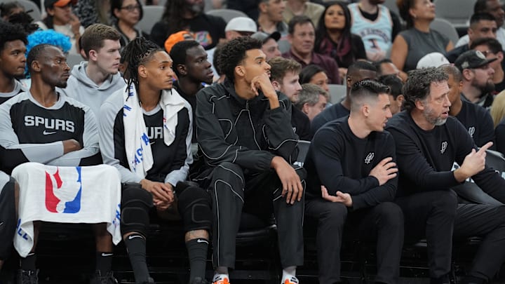   San Antonio Spurs center Victor Wembanyama (1) looks on from the bench in the first half against the Oklahoma City Thunder at Frost Bank Center. Mandatory Credit: Daniel Dunn-Imagn Images