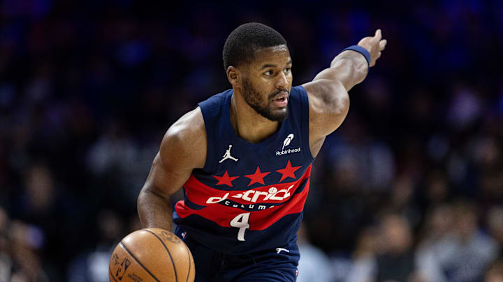Jan 8, 2025; Philadelphia, Pennsylvania, USA; Washington Wizards guard Jared Butler (4) controls the ball against the Philadelphia 76ers during the second quarter at Wells Fargo Center. Mandatory Credit: Bill Streicher-Imagn Images