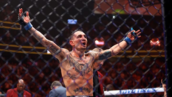 Apr 13, 2024; Las Vegas, Nevada, USA; Max Holloway celebrates after knocking out Justin Gaethje (not pictured) during UFC 300 at T-Mobile Arena. Mandatory Credit: Mark J. Rebilas-Imagn Images