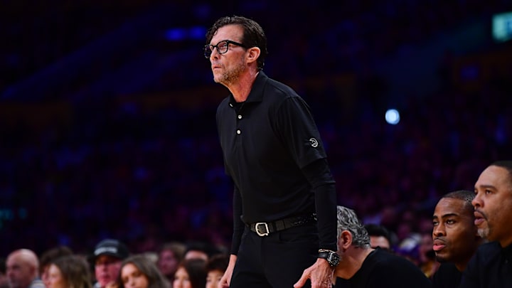 Jan 3, 2025; Los Angeles, California, USA; Atlanta Hawks head coach Quin Snyder watches game action against the Los Angeles Lakers during the first half at Crypto.com Arena. Mandatory Credit: Gary A. Vasquez-Imagn Images