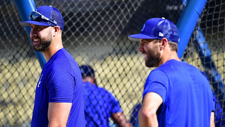 Oct 12, 2022; Los Angeles, California, USA; Los Angeles Dodgers left fielder Joey Gallo (12) and left fielder Chris Taylor (3) before game two of the NLDS for the 2022 MLB Playoffs against the San Diego Padres at Dodger Stadium. 