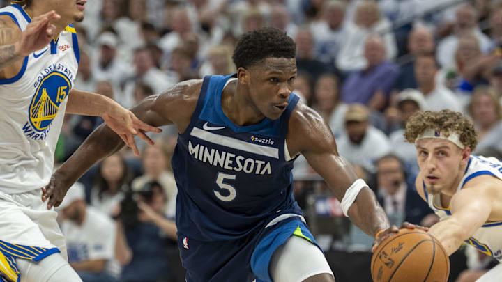 Anthony Edwards dribbles the ball against the Warriors.