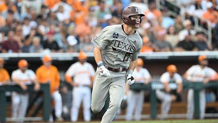 Jun 22, 2024; Omaha, NE, USA; Texas A&M Aggies left fielder Caden Sorrell (13) drives in a run against the Tennessee Volunteers during the first inning at Charles Schwab Field Omaha. Mandatory Credit: Steven Branscombe-Imagn Images Jun 22, 2024; Omaha, NE, USA; Texas A&M Aggies left fielder Caden Sorrell (13) drives in a run against the Tennessee Volunteers during the first inning at Charles Schwab Field Omaha. Mandatory Credit: Steven Branscombe-Imagn Images
