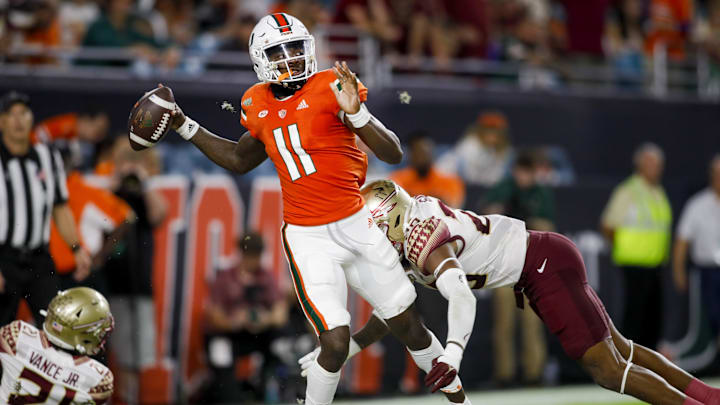 Nov 5, 2022; Miami Gardens, Florida, USA; Miami Hurricanes quarterback Jacurri Brown (11) throws the