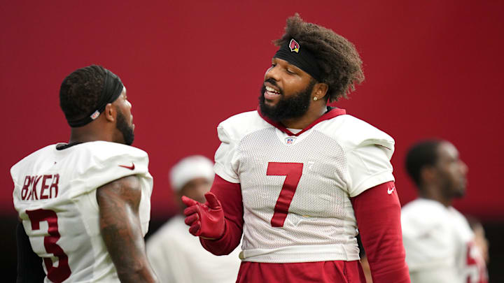 Arizona Cardinals Kyzir White chats with teammate Budda Baker. Arizona Cardinals Kyzir White chats with teammate Budda Baker.