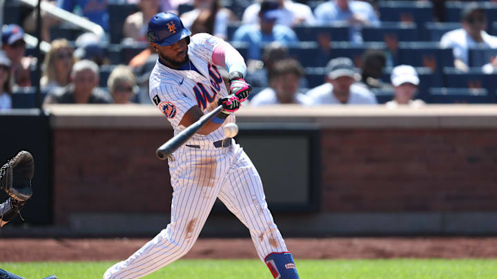 Jul 6, 2025; New York City, New York, USA; New York Mets left fielder Starling Marte (6) singles during the sixth inning against the New York Yankees at Citi Field. Mandatory Credit: Vincent Carchietta-Imagn Images