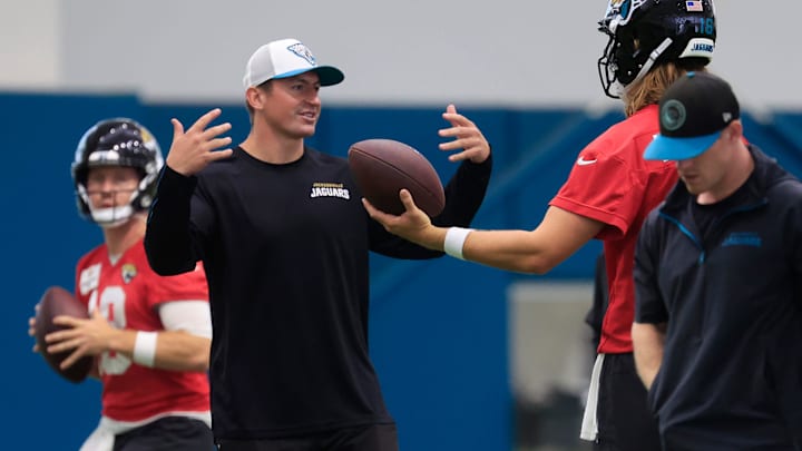 Jacksonville Jaguars quarterback Trevor Lawrence (16) talks with during offensive coordinator Grant Udinski during the 10th organized team activity at Miller Electric Center Wednesday, June 4, 2025 in Jacksonville, Fla. [Corey Perrine/Florida Times-Union]