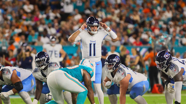 Sep 30, 2024; Miami Gardens, Florida, USA; Tennessee Titans quarterback Mason Rudolph (11) reacts before a play against the Miami Dolphins during the second quarter at Hard Rock Stadium. Mandatory Credit: Sam Navarro-Imagn Images