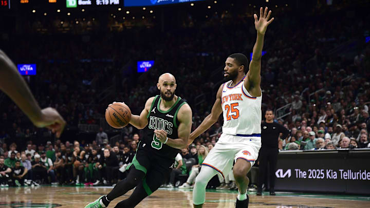 May 14, 2025; Boston, Massachusetts, USA; New York Knicks forward Mikal Bridges (25) defends Boston Celtics guard Derrick White (9) in the second half during game five of the second round for the 2025 NBA Playoffs at TD Garden. Mandatory Credit: Bob DeChiara-Imagn Images May 14, 2025; Boston, Massachusetts, USA; New York Knicks forward Mikal Bridges (25) defends Boston Celtics guard Derrick White (9) in the second half during game five of the second round for the 2025 NBA Playoffs at TD Garden. Mandatory Credit: Bob DeChiara-Imagn Images