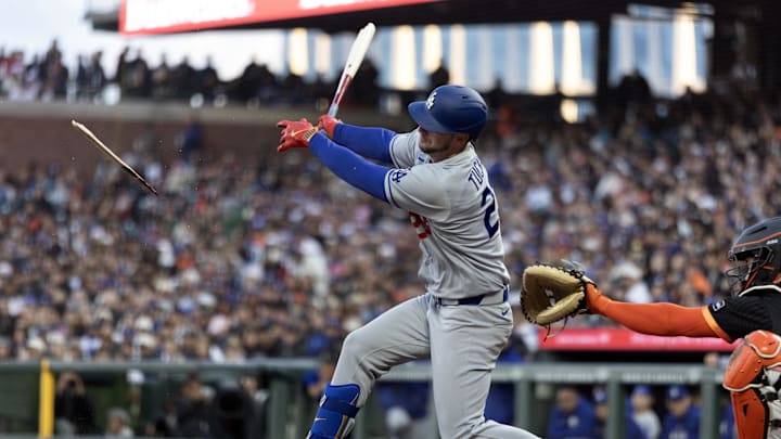 Los Angeles Dodgers right fielder Kyle Tucker (23) breaks his bat fouling off a pitch against the San Francisco Giants during the third inning at Oracle Park on April 21, 2026.