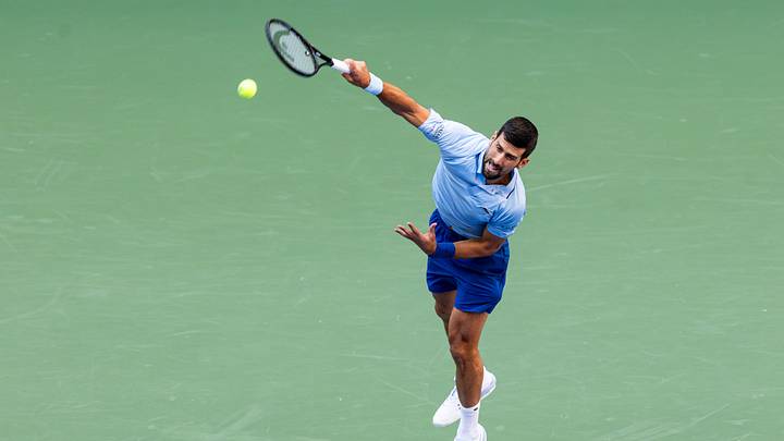 Sep 5, 2025; Flushing, NY, USA; Novak Djokovic of Serbia serves against Carlos Alcaraz of Spain in the semifinal of the men’s singles at the US Open at Arthur Ashe Stadium in Billie Jean King National Tennis Center. Mandatory Credit: Mike Frey-Imagn Images Sep 5, 2025; Flushing, NY, USA; Novak Djokovic of Serbia serves against Carlos Alcaraz of Spain in the semifinal of the men’s singles at the US Open at Arthur Ashe Stadium in Billie Jean King National Tennis Center. Mandatory Credit: Mike Frey-Imagn Images
