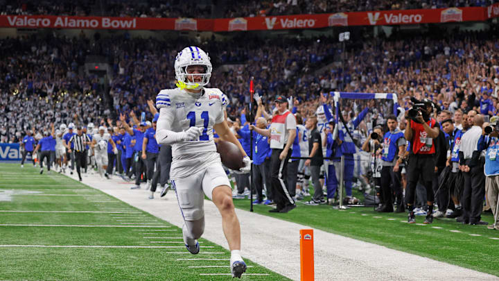 BYU's Parker Kingston returns a kick for a touchdown against Colorado at the Valero Alamo Bowl