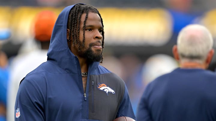 Sep 21, 2025; Inglewood, California, USA;  Denver Broncos linebacker Dre Greenlaw (57) on the sidelines prior to the game against the Los Angeles Chargers at SoFi Stadium. Mandatory Credit: Jayne Kamin-Oncea-Imagn Images