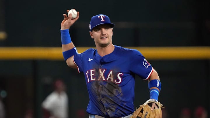 Texas Rangers third base Josh Jung (6) makes the play for an out against the Arizona Diamondbacks in the first inning at Chase Field in 2024. Texas Rangers third base Josh Jung (6) makes the play for an out against the Arizona Diamondbacks in the first inning at Chase Field in 2024.