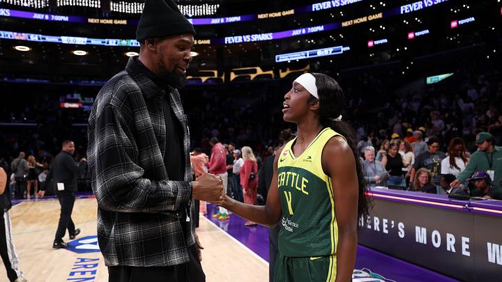 Jul 6, 2026; Los Angeles, California, USA; Seattle Storm guard Flau'jae Johnson (4) is greeted by Kevin Durant (left) after defeating the Los Angeles Sparks at Crypto.com Arena. Mandatory Credit: Kiyoshi Mio-Imagn Images Jul 6, 2026; Los Angeles, California, USA; Seattle Storm guard Flau'jae Johnson (4) is greeted by Kevin Durant (left) after defeating the Los Angeles Sparks at Crypto.com Arena. Mandatory Credit: Kiyoshi Mio-Imagn Images