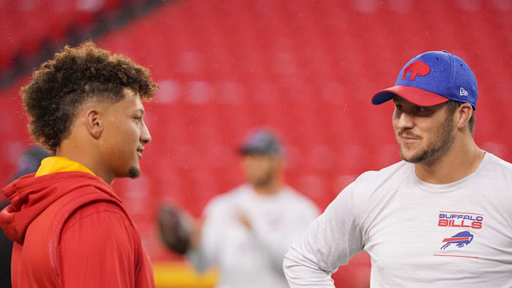 Oct 10, 2021; Kansas City, Missouri, USA; Kansas City Chiefs quarterback Patrick Mahomes (15) talks with Buffalo Bills quarterback Josh Allen (17) before warm ups at GEHA Field at Arrowhead Stadium. Mandatory Credit: Denny Medley-Imagn Images