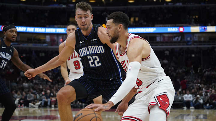 Orlando Magic forward Franz Wagner (22) defends Chicago Bulls guard Zach LaVine (8) during the first quarter at United Center.