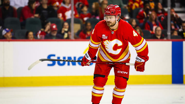 Jan 17, 2026; Calgary, Alberta, CAN; Calgary Flames defenseman Rasmus Andersson (4) against the New York Islanders during the second period at Scotiabank Saddledome. Mandatory Credit: Sergei Belski-Imagn Images