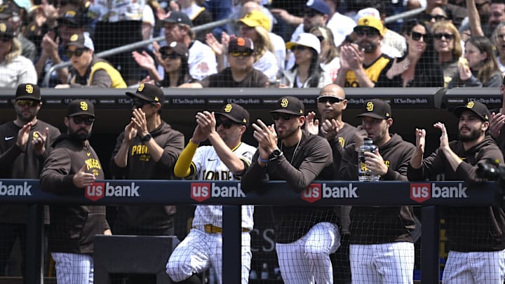 Mar 28, 2024; San Diego, California, USA; San Diego Padres starting pitcher Joe Musgrove (44) looks on alongside starting pitchers Michael King (34) and Dylan Cease (84) during the first inning against the San Francisco Giants at Petco Park. Mandatory Credit: Orlando Ramirez-Imagn Images