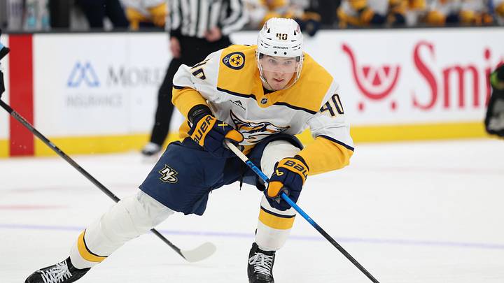 Apr 9, 2026; Salt Lake City, Utah, USA; Nashville Predators center Fedor Svechkov (40) skates with the puck against the Utah Mammoth during the third period at Delta Center. Mandatory Credit: Rob Gray-Imagn Images